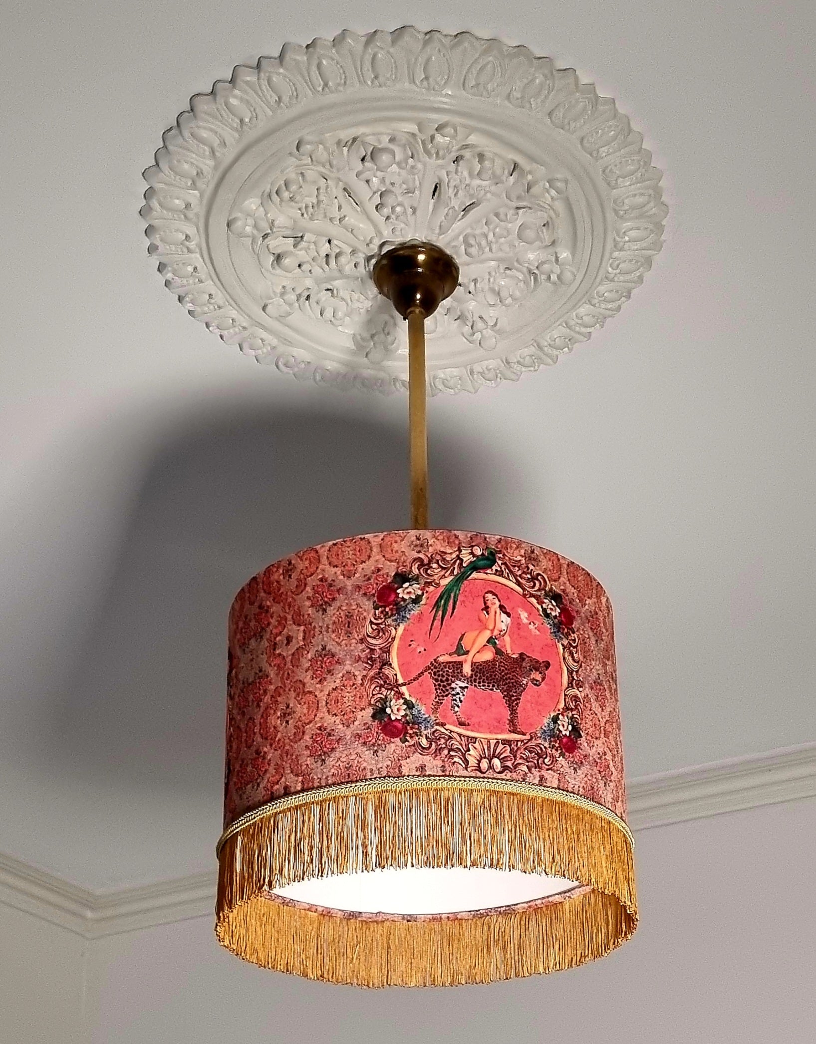 Alice Vintage Tassel Drum Lamp shade with intricate fringe and artistic pattern hanging from ceiling