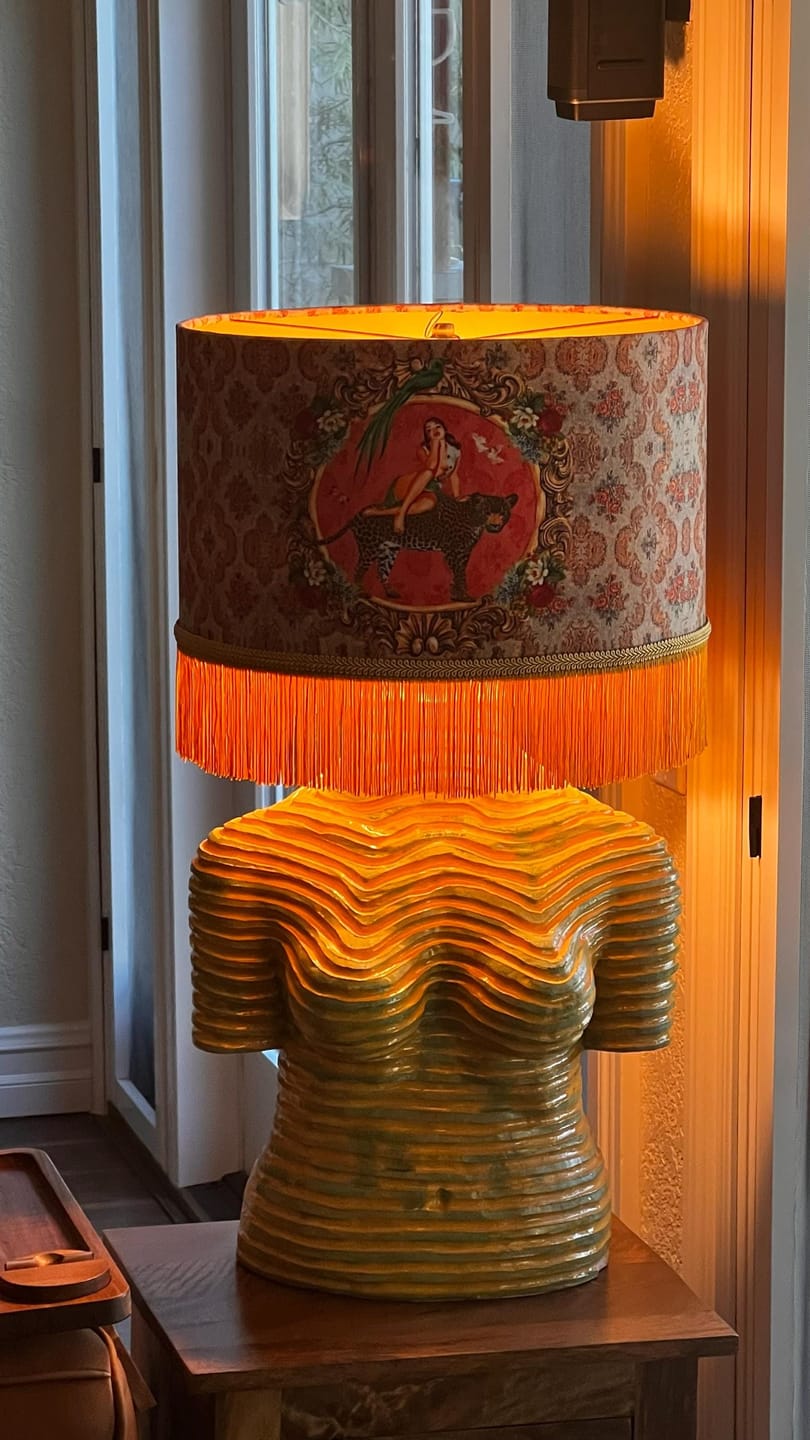 Alice Vintage Tassel Drum Lamp shade with fringed edges on a sculpted bust base by Queen K