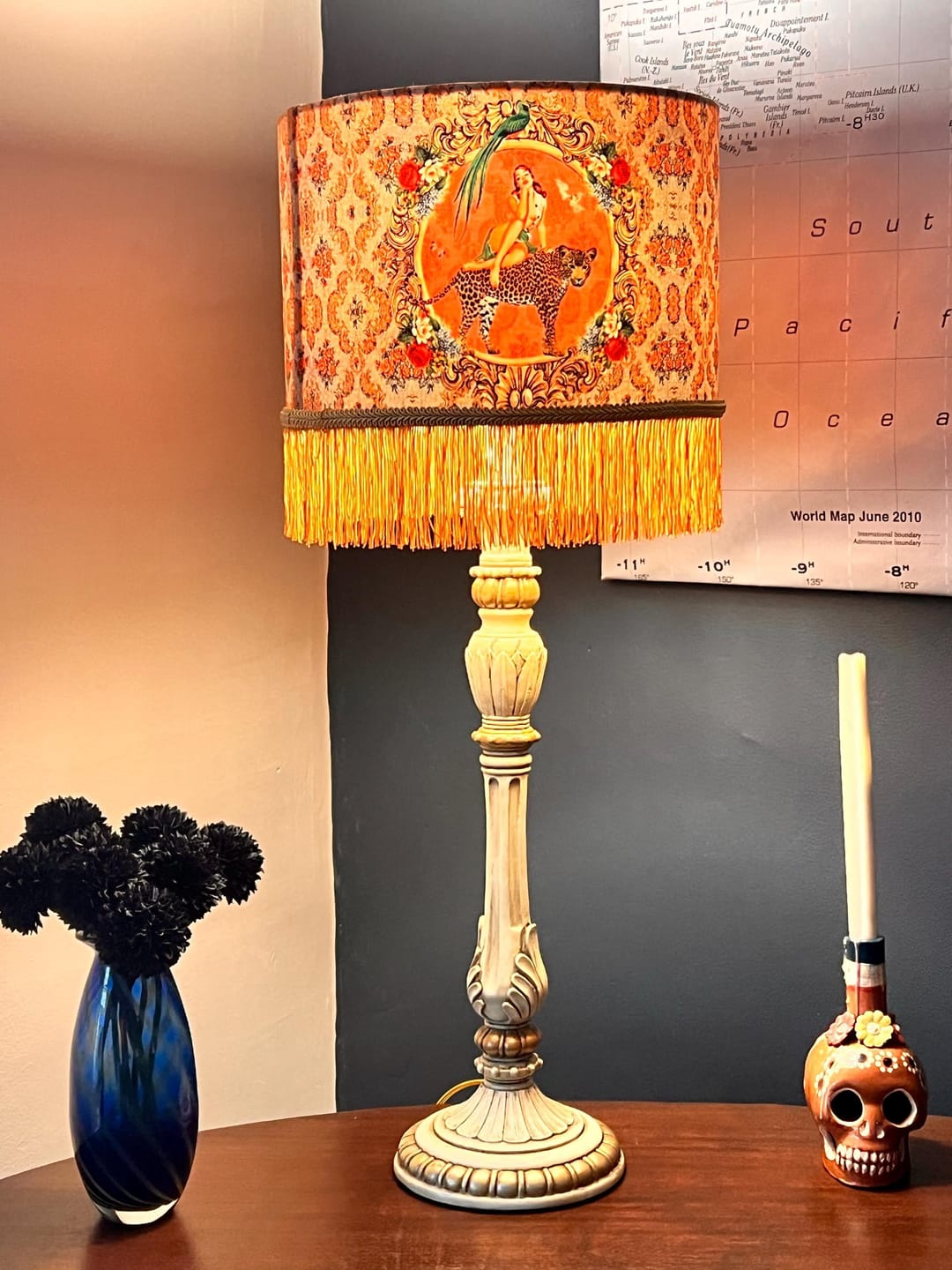 Queen K Alice Vintage Tassel Drum Lamp shade with orange fringe on ornate cream lamp base