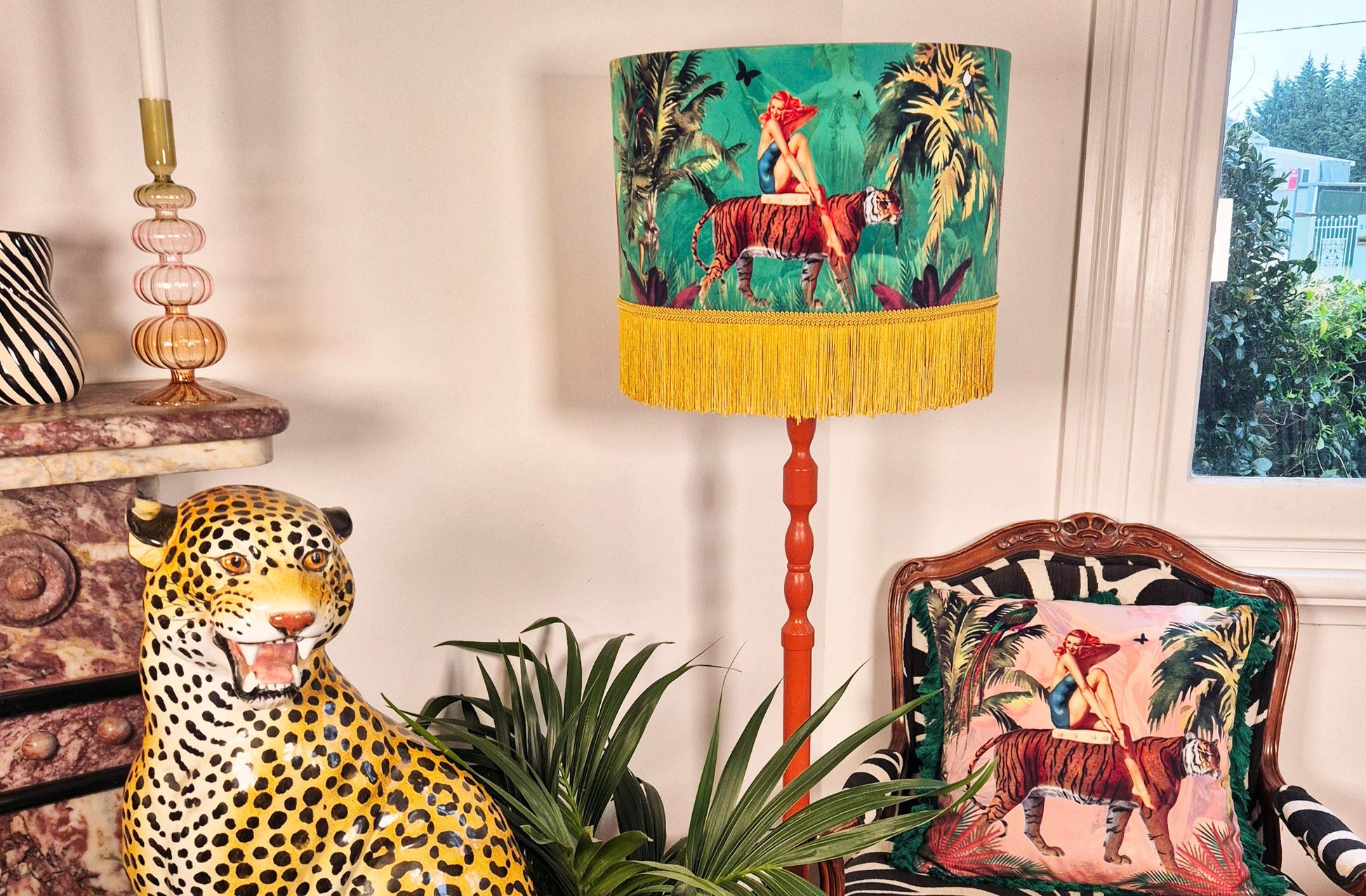 Queen K Jungle Walk Green Tassel Fringed Drum Lampshade with tropical animal print and yellow tassels