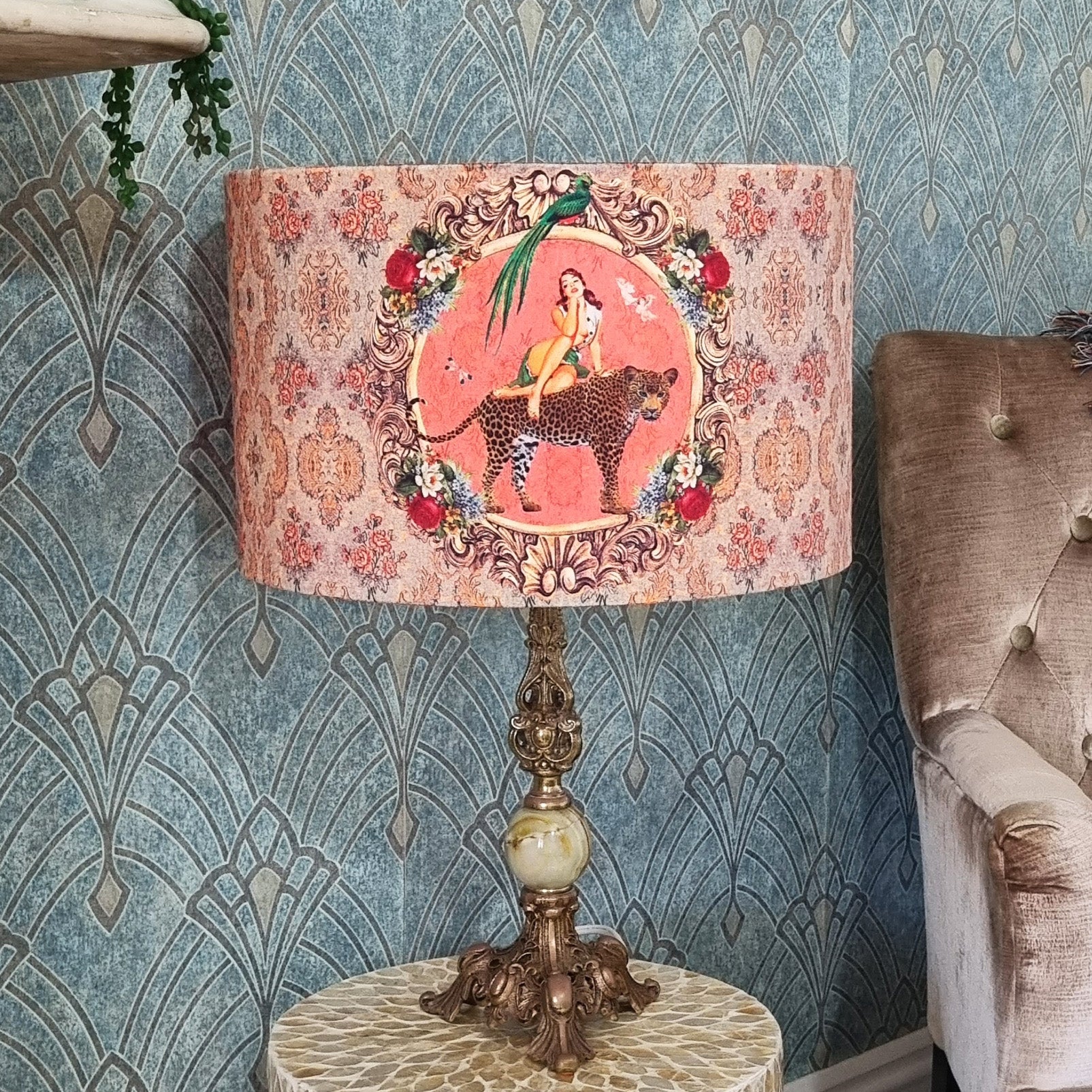 Alice Vintage Drum Lampshade by Queen K with intricate vintage artwork on a decorative table lamp