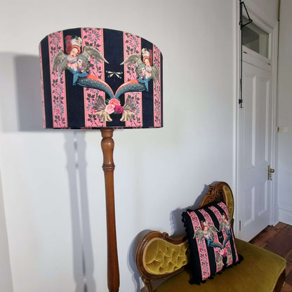 Queen K Mermaid Drum Lampshade Pink with angel and floral pattern on wooden floor lamp